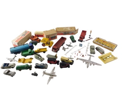 A collection of Dinky and other toys, to include a Foden eight wheel wagon, in brown livery, with box, Foden two tonne blue fourteen tonne tanker, in box, a Dinky Super Toys dumper truck, and other Dinky diecast vehicles. (AF)