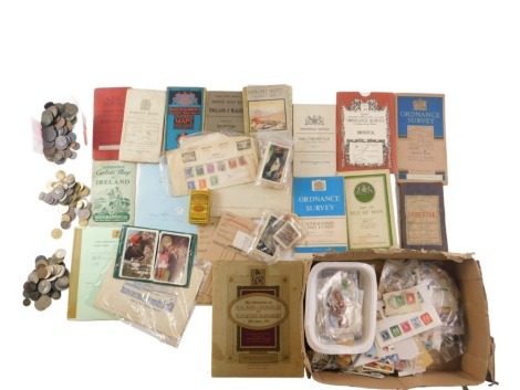 A quantity of stamps, coins, maps, etc.