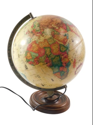 A Danish Scan-Globe with copyright 1993, and an oak Art Deco barometer and thermometer.