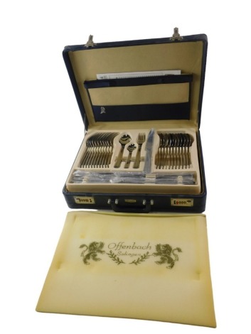 A cased set of Solingen plated cutlery, with angular handles, etc., in blue PVC combination case.