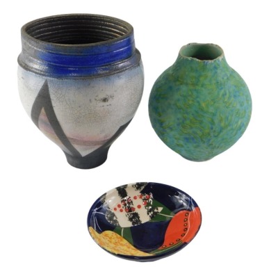 A studio pottery vase, with blue, green, pink, black and other coloured crackle glazed, indistinct makers monogram, a green mottled studio pottery vase, initialled PFB, and a dish hand scripted mark to underside Gwilis.L. (3)