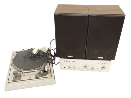 A dual 505 belt drive turntable, a Rotel amplifier, and a pair of Wharfedale Laser Range speakers. (AF)