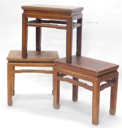 Three similar Chinese low urn tables, each with a shaped frieze, on plain supports, approx 49cm high, 51cm wide. (AF)