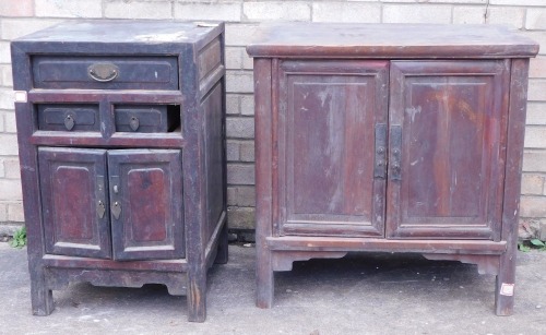 Two Chinese side cabinets, both with two panelled doors, one with three drawers, both on plain supports, 76cm and 48cm wide respectively. (AF)