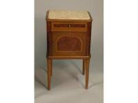 An early 20thC French walnut and amboyna veneered marble topped bedside