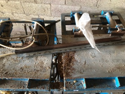 A hydraulic press string mitre joiner. - 2