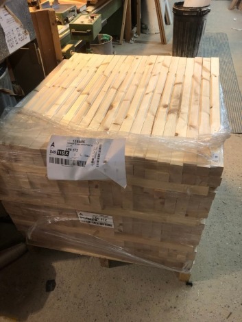 A pallet of redwood bannisters.