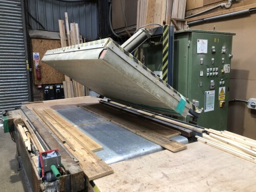 A Wadkin residual frequency press, for bonding panels of timber.