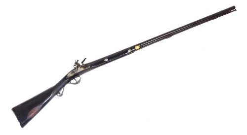 An antique flintlock rifle, marked to barrel side FX 221 BX -73, overall length 134cm, barrel length 95cm.