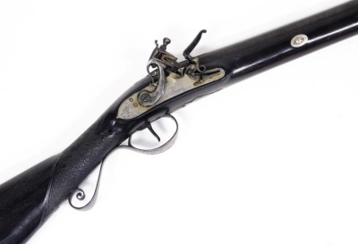 An antique flintlock rifle, marked to barrel side FX 221 BX -73, overall length 134cm, barrel length 95cm. - 2