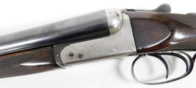 A Webley & Scott Limited 12-bore side by side boxlock ejector shotgun, Ser. No. 91077, 28" barrels, LoP c.15" which includes current inch-and-a-half extension block, in a velvet lined canvas case with label for P. Orr & Sons, Gunsmiths, Licensed Dealers - 3