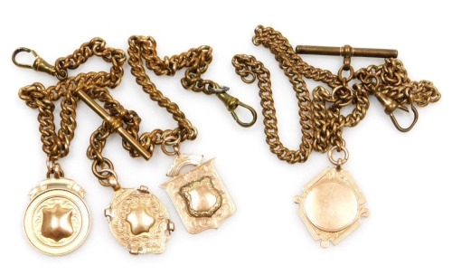 Four 9ct rose gold prize medallions, three named for A Taylor, Three Horseshoes SC Champions, 1934-1935 and 1935-1936, and an unnamed medallion, on base metal kerb link Albert chains, with T bars as fitted, medallions approximately 26.7g.