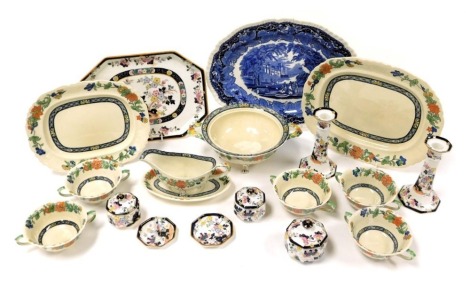 A group of Masons Ironstone, including dinner wares, pattern C2277, with meat platters, vegetable tureen, sauce boat on stand, and soup cups, and a dressing table set on tray. (a quantity)