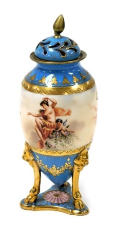 A late 19thC Bohemian pot pourri vase and cover, decorated with a goddess and cherubs, within a turquoise blue and heightened ground, raised on three lions head and hoof monopodia, above a triform base, pseudo Vienna mark, 24cm high.