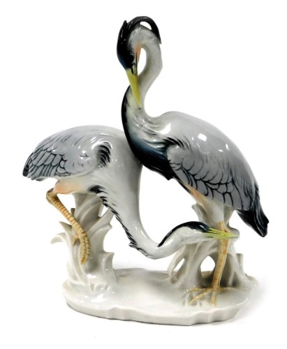 A Karl Ens porcelain figure group of a pair of Herons, number 7299m impressed and printed marks, 22cm wide.