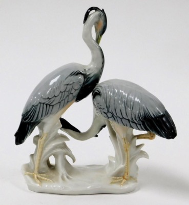 A Karl Ens porcelain figure group of a pair of Herons, number 7299m impressed and printed marks, 22cm wide. - 2