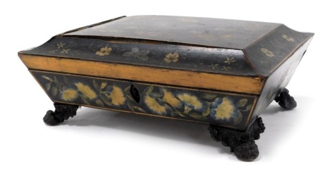 A Regency sarcophagus form painted sewing box, decorated with butterflies and flowers, the hinge lid opening to reveal a fitted interior, raised on four brass paw feet, 29cm wide.