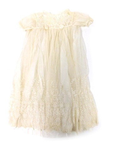 An early 20thC satin and lacework christening gown.