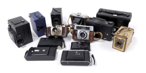 A group of vintage box and other cameras, including an Ensign camera number E29, Ensign Reflex camera, Kodak, Agfa, and other cameras. (a quantity)