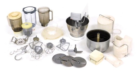 A Kenwood Chef food mixer, with attachments, further mixing bowl, blenders, high speed shredder and slicer, and a high speed juice separator. (a quantity)