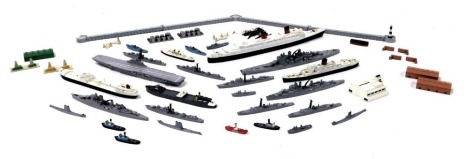 A group of Hornby Tri-ang Minic Meta warships, submarines, oil tanker, RMS Queen Elizabeth, and dockside buildings and accessories. (a quantity)