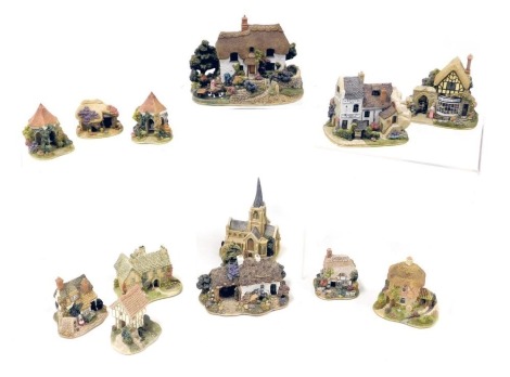 A group of Lilliput Lane cottages, boxed, including Hilltop, The Flower Basket, Ye Olde Trip To Jerusalem, Scotch Visit, Water's Edge, and Peppermill Cottage. (a quantity)