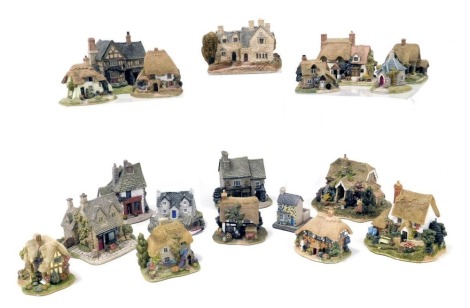 A group of Lilliput Lane cottages, some boxed, including The Stone Mason, Puddle Duck, Cabbage Patch Corner, Blue Boar, Fry Days, and Moreton Manor. (a quantity)