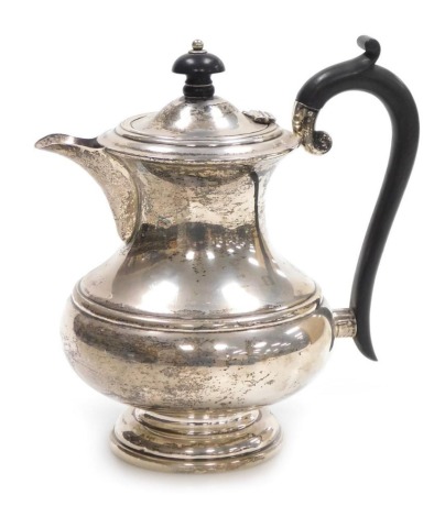 A George V silver coffee pot, of baluster form, Birmingham 1932, 14.31oz.