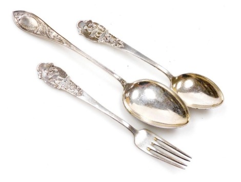 A Continental fork and spoon set, the terminal embossed with a boy riding a goat, stamped 830, and a French tablespoon, with an oval reserve, name engraved, stamped 830, 2.80oz.