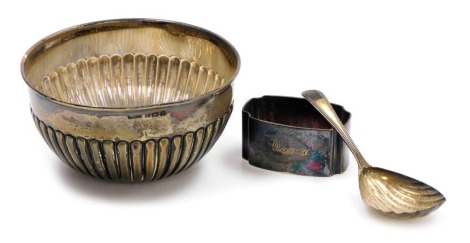 A George V silver sugar bowl, of semi fluted form, Birmingham 1912, together with a Georgian silver caddy spoon, and George VI silver napkin ring, name engraved for David, Sheffield 1947, 3.55oz.