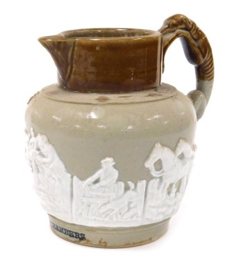 A mid 19thC stoneware hunting jug, two tone, with a hound handle, named to the rim of the body with ''Mrs Chambers'', 17cm high.