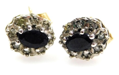 A pair of 9ct gold sapphire and diamond earrings, in a high claw oval basket setting, 1.7g.