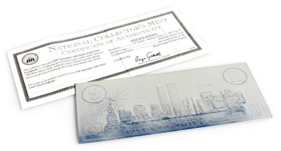 A National Collector's Mint September 11th commemorative twenty dollar silver leaf coin certificate, with certificate.