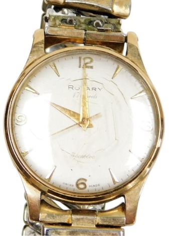 A Rotary Incabloc 9ct gold cased gentleman's wristwatch, circular silvered dial, with Arabic numerals at quarters, centre seconds, seventeen jewelled movement, on a plated strap. (AF)