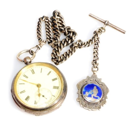 An Edward VII silver cased gentleman's pocket watch, open faced, key wind, circular enamel dial bearing Roman numerals, subsidiary seconds dial, the case with engine turned decoration, vacant shield and garter reserve, on a silver curb link Albert chain, 