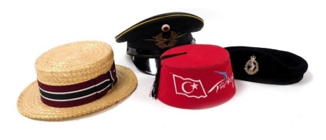 A Bamberger Mutzen-Industrie Landgraf military cap 1968, size 55, a Royal Army dental Corps beret, George Arthur Dunn boater, size 6 3/4, and a Turkish souvenir fez, size 5. (4)