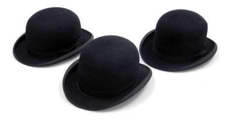 A Jacksons Ltd The "National" bowler hat, a Dunn & Co bowler hat, size 6 3/4, and another, "The Perfectus", size 7. (3)