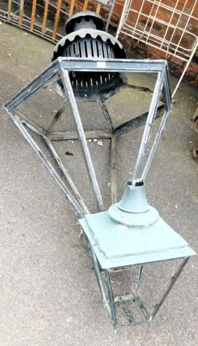 A 19thC hexagonal lead and cast iron lantern frame, approximately 148cm high, 98cm wide, together with a copper lantern frame, 68cm high, 38cm wide. (2)