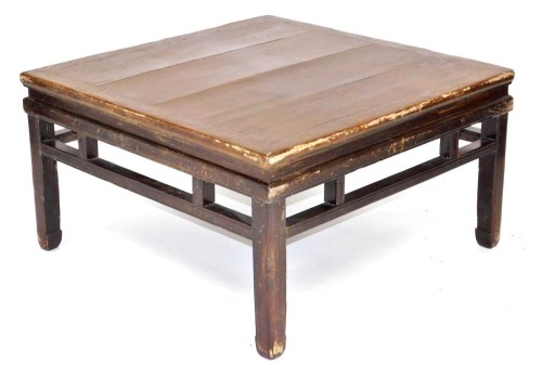 A Chinese hardwood occasional table, with a galleried sides, raised on square legs, 50cm high, 93cm wide.