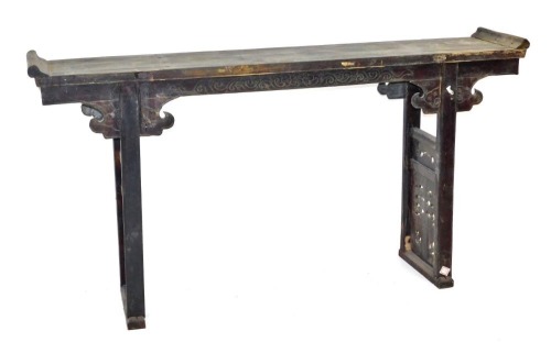 A Chinese hardwood altar table, with a carved frieze, raised on square legs with carved side panels, 96cm high, 181cm wide, 37.5cm deep.