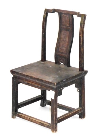 A Chinese hardwood chair, with a carved panelled and scrolling splat, solid seat, raised on square legs united by a box stretcher, 45cm wide.