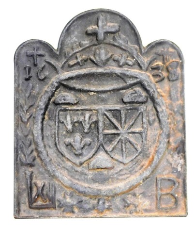 A Charles I cast iron fire back, with a triple scroll top cast centrally with two coats of arms, possibly denoting a marriage, within a laurel wreath, beneath crosses and dated 1638, above initials L, XI within, and B, 70cm high, 56.5cm wide.