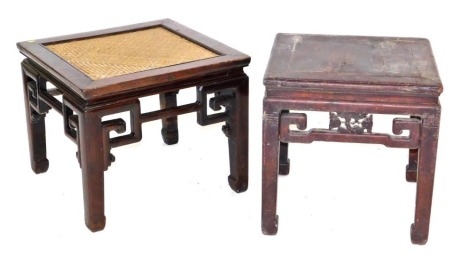 A Chinese hardwood and rattan occasional table, with a carved frieze, raised on square legs, 47cm high, 56cm wide, 56cm deep, and a further hardwood occasional table, with a solid wood top, raised on square legs, 49.5cm high, 49.5cm wide, 49.5cm deep. (2)