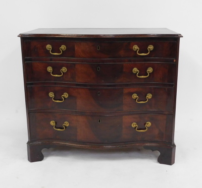 A George III figured mahogany serpentine fronted chest, of four drawers with triple veneer fronts and brass swans neck handles, with reeded flat pilasters, on shaped bracket feet, 82cm high, 93cm wide, 52cm deep. - 2