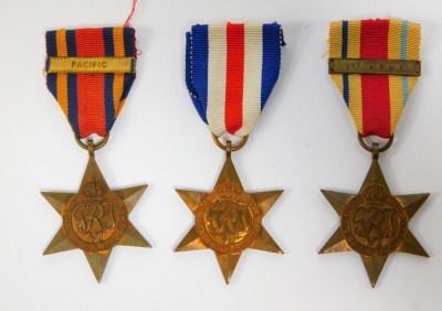 Seven WWII medals, comprising the Atlantic Star, the Pacific Star, the 1939-45 Star, the France and Germany Star, the Italy Star, the Burma Star with Pacific bar and the Africa Star with 1st Army bar, each with ribbons. - 2