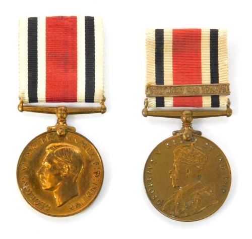 Two Special Constabulary Faithful Service medals, comprising a George VI medal named to Benjamin Holland, and a George V medal named to Arthur Butler, with ribbons.