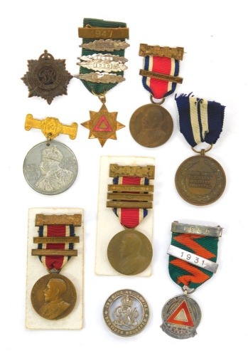 A WWI Services Rendered wound badge, numbered 322389, a Beech House Auxiliary Military Hospital medal, Edward VII punctual attendance medal, driving safety related medals, one hall marked silver, various Kings medals, etc.