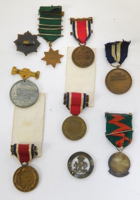 A WWI Services Rendered wound badge, numbered 322389, a Beech House Auxiliary Military Hospital medal, Edward VII punctual attendance medal, driving safety related medals, one hall marked silver, various Kings medals, etc. - 2