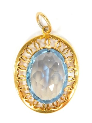 A 9ct gold pendant, with central light blue stone, possibly a topaz, in a pierced outer frame, one claw missing, 2.5cm x 1.5cm, 7.9g all in.