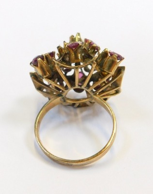 An abstract dress ring, the shaped ring set with amethyst stones, on a yellow metal band stamped 14K, ring size M½, 5.9g all in. (AF) - 2